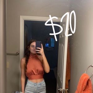 High neck open back top